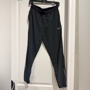 Nike Black and Gold Dri-FIT Athletic Top